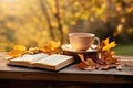 Cup of hot tea and book in the park, autumn leaves , AI Generated Royalty Free Stock Photo