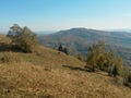 Fall season at the mountain with colorfully trees, meadows and hills Royalty Free Stock Photo