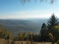 Fall season at the mountain with colorfully trees, meadows and hills