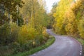 Fall season by a less travelled road Royalty Free Stock Photo