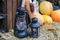 Fall theme. Several pumpkins and a bale of straw