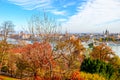 Fall trees in the foreground with the amazing cityscape of Budapest, Hungary in the background. Hungarian Parliament Building with