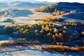 The fall trees on hillside and river Royalty Free Stock Photo