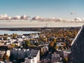 Fall view over the city of Tallinn with tall buildings and colorfull trees, Estonia