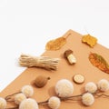 Fall Winter flat lay art. Autumn decor mushrooms, leaf and brunch. Trendy brown and beige colours shades. Seasonal stylish