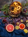 Fall and winter ingredients still life with grapefruits,lemon,, cranberry, nuts and spices, herbs Ingredients for Christmas Baking Royalty Free Stock Photo