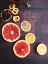 Fall and winter ingredients still life with grapefruits, lemon,cydonia, cranberries on wooden background, antioxidants, vitamin C Royalty Free Stock Photo