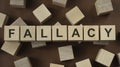 FALLACY word made with building blocks isolated Royalty Free Stock Photo