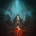 Fallen angel with black wings Royalty Free Stock Photo