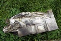 Fallen angel. Destroyed tombstone at the abandoned cemetery.