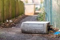 Fallen broken electrical box outdoors on footpath with cable wires exposed Royalty Free Stock Photo