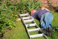 Fallen man from ladder unconscious. Royalty Free Stock Photo