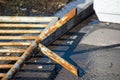 Fallen metal fence with corrosion on road