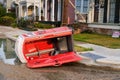 Fallen Portable Toilet on a City Street