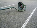 Fallen street lamp on a parking area Royalty Free Stock Photo