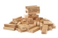 The fallen tower from the wooden blocks of the game Jenga Tower on a white background close-up. Home entertainment Royalty Free Stock Photo