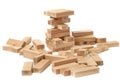 The fallen tower from the wooden blocks of the game Jenga Tower on a white background close-up. Home entertainment Royalty Free Stock Photo