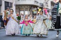 Fallera Commission parading down Calle de la Paz, seen from front, during the Fallas offering. Valencia, Spain - March Royalty Free Stock Photo