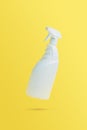 Falling in air toilet or window cleaner white bottle with sprayer Royalty Free Stock Photo