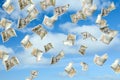 Falling American dollars and sky on background. Money rain Royalty Free Stock Photo