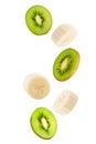 Falling banana and kiwi fruits isolated on white background Royalty Free Stock Photo