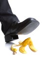 Falling on a banana skin Royalty Free Stock Photo