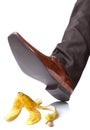 Falling on a banana skin Royalty Free Stock Photo