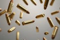 Falling bullets border over white background with light Royalty Free Stock Photo