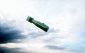 Falling bombs against the dark sky. Atom bomb. 3d rendering Royalty Free Stock Photo