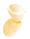 falling broken potato chips isolated on white