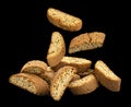 Cantuccini biscuits, Italian almond cookies on black background