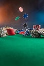 Falling chips on a poker table in a casino. Online poker bets Royalty Free Stock Photo