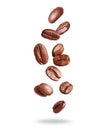 Falling coffee beans close up isolated on a white background Royalty Free Stock Photo