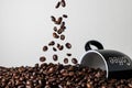 Falling coffee beans on a light background Royalty Free Stock Photo