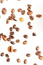 Falling coffee beans isolated on white background, clipping path, full depth of field. Cereal product. Hot drink. Close up. Royalty Free Stock Photo