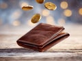 Falling coins onto a leather wallet with a bokeh background Royalty Free Stock Photo