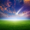 Falling comet and hot air ballons in sunset sky Royalty Free Stock Photo