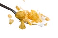 Falling cornflakes on the spoon with milk Royalty Free Stock Photo