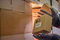 Falling and damage to packaging and goods in parcels in the warehouse. Problems with the safety of cargo during postal delivery Royalty Free Stock Photo