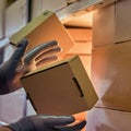 Falling and damage to packaging and goods in parcels in the warehouse. Problems with the safety of cargo during postal delivery Royalty Free Stock Photo