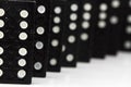 Falling dominoes. Domino effect.