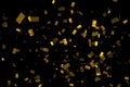 Falling down golden metallic glitter foil confetti, animation movement on black background, gold christmas, holiday event happy Royalty Free Stock Photo