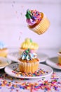 falling Easter cupcake and sprinkles