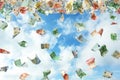 Falling Euro banknotes and sky on background. Money rain Royalty Free Stock Photo