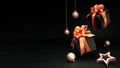 Falling gift boxes with orange ribbon, balls, star with copy space. Xmas present,