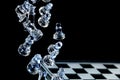 Falling Glass Chess Pieces Royalty Free Stock Photo