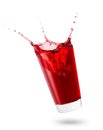 Falling glass with red juice Royalty Free Stock Photo