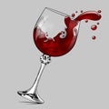 Falling glass with splashed red wine Royalty Free Stock Photo