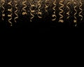 Falling gold curling ribbons or party serpentine with confetti isolated on black.