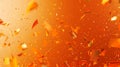 falling gold glitter foil confetti, on orange background, holiday and festive fun concept Royalty Free Stock Photo